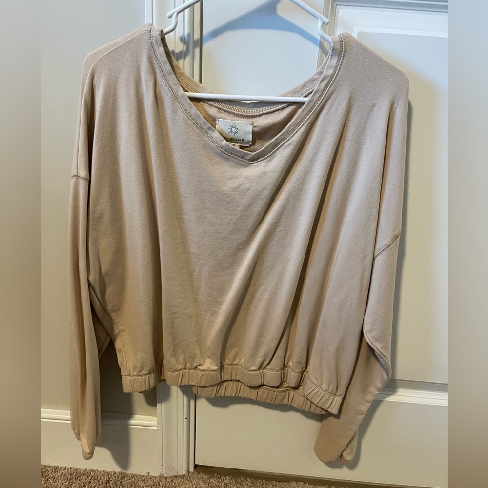 Long sleeve light pink lounge top with elastic bottom